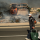 James and Josie Ralstin carry belongings from their Ventura, Calif., home as flames from a wildfire consume another residence on Tuesday, Dec. 5, 2017. The couple evacuated early Tuesday morning as the fire approached, but returned to retrieve medications and other property. (AP Photo/Noah Berger)